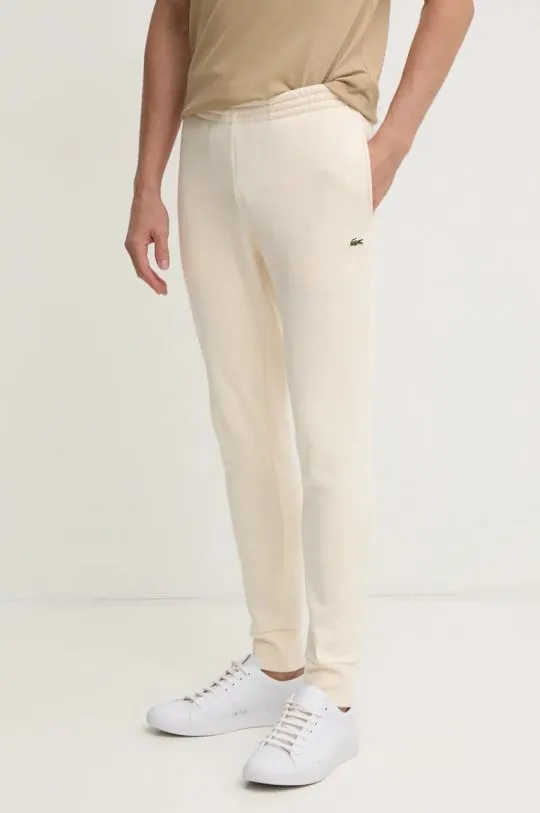 Lacoste joggers beige color smooth